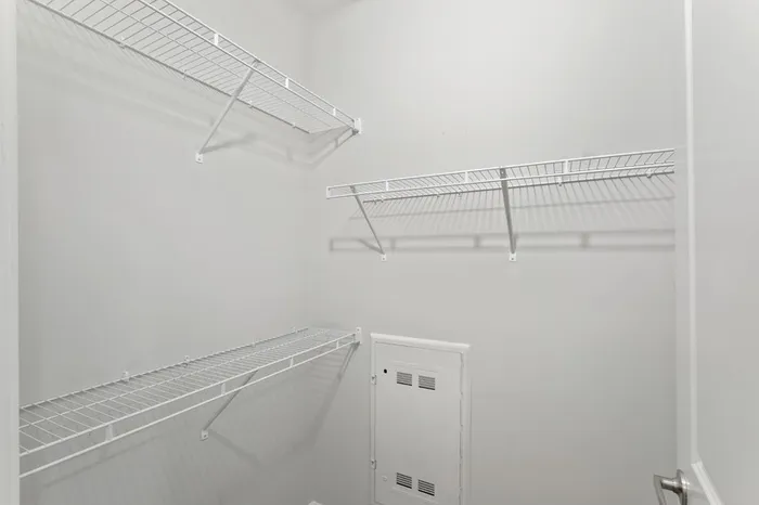 Spacious closet at Lantower Garrison Park with storage shelves.