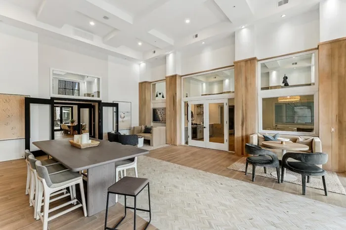Community room with ample seating and natural light at Lantower Westshore.