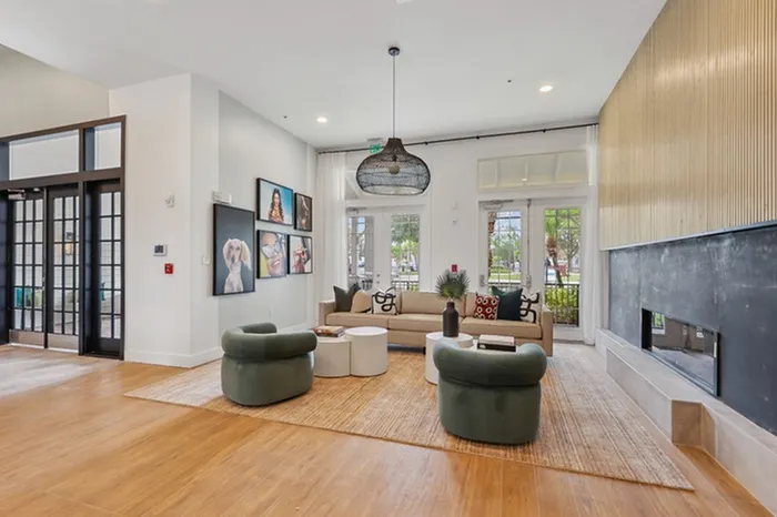 Seating area at Lantower Tortuga bay with plenty of furniture, recessed lighting, and fireplace.