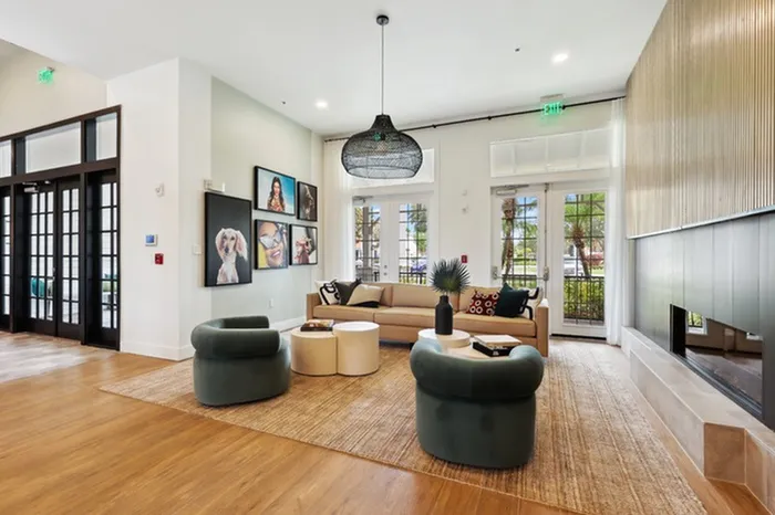 Community seating area with fireplace at Tortuga Bay at Waterford Lakes.