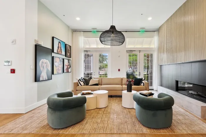 Community seating area with fireplace at Tortuga Bay at Waterford Lakes.