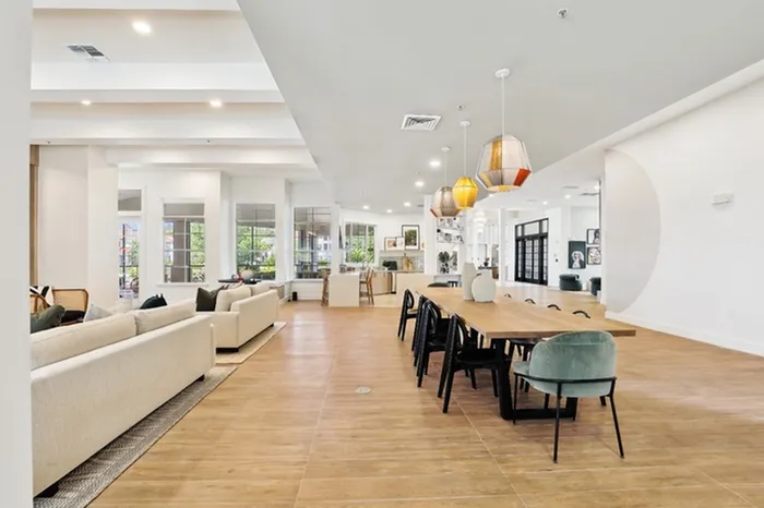 Community room with natural light and ample seating at Tortuga Bay at Waterford Lakes.