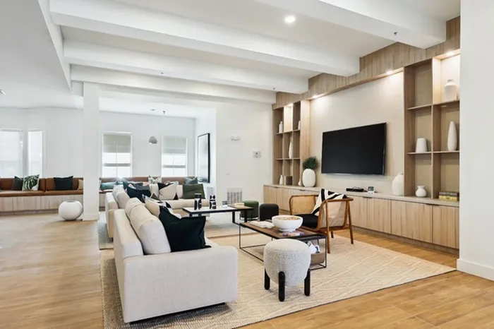 Community room with natural light and ample seating at Tortuga Bay at Waterford Lakes.