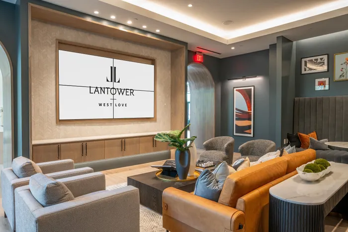 Elegant lounge area at Lantower West Love featuring modern seating, stylish decor, and ambient lighting.