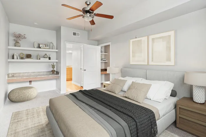 bedroom with shelves and a bed