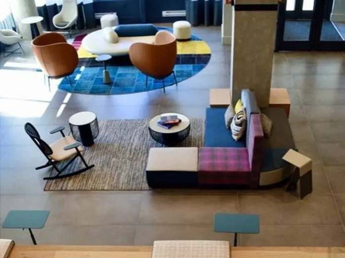 Stunning Two Story Lobby with Numerous Gathering Spaces and Stadium Style Seating with Media Outlets