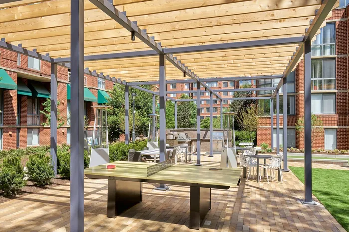 Newly Renovated Courtyard with Ping Pong, Numerous Seating Areas & More | Meridian at Courthouse Commons | Luxury Arlington, VA Aparmtents