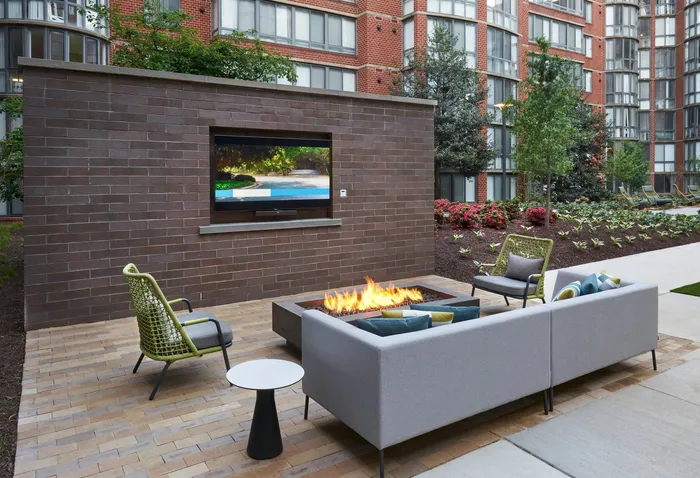 Renovated Courtyard with Televisions, Fire Pits & More | Meridian at Courthouse Commons | Arlington, VA Apartments
