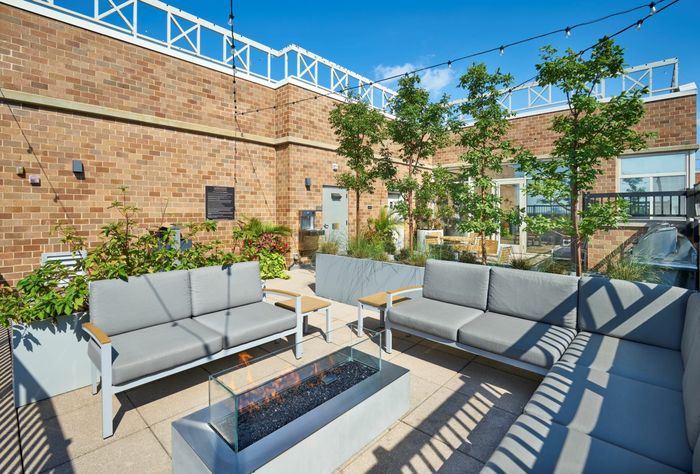 Newly Renovated Rooftop Lounge With Fire Pit | Meridian at Ballston Commons | Arlington VA Apartments