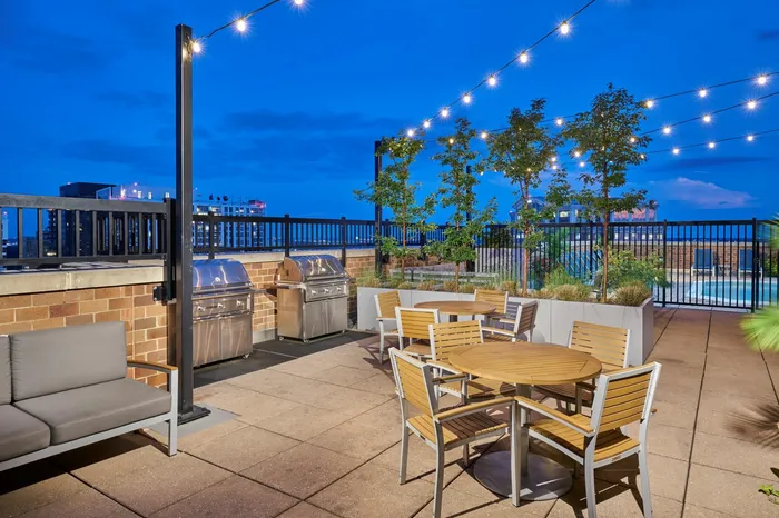Relax and Cook Out in the Newly Renovated Rooftop Outdoor Lounge | Meridian at Ballston Commons | Arlington VA Apartments