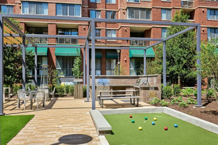 Grill Out and Enjoy a Game of Bocce In Our Courtyard | Meridian at Courthouse Commons | Luxury Arlington VA Apartments