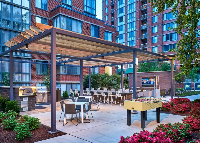 Grill Our and Play Some Foosball With Friends in the Courtyard | Meridian at Courthouse Commons | Luxury Arlington VA Apartments