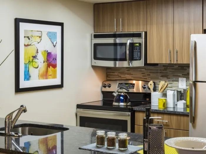 Renovated Apartments With Granite Countertops, Wood-Style Flooring and Stainless Steel Appliances | Meridian at Courthouse Commons | Luxury Arlington VA Apartments
