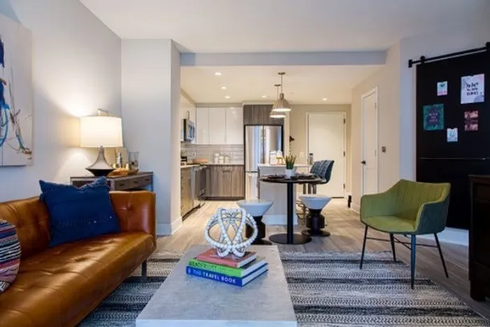 Kitchens with Granite Countertops, Islands, Stainless Steel Appliances and Wood-Style Flooring | Meridian on First | Navy Yard Apartments | Washington DC Apartments