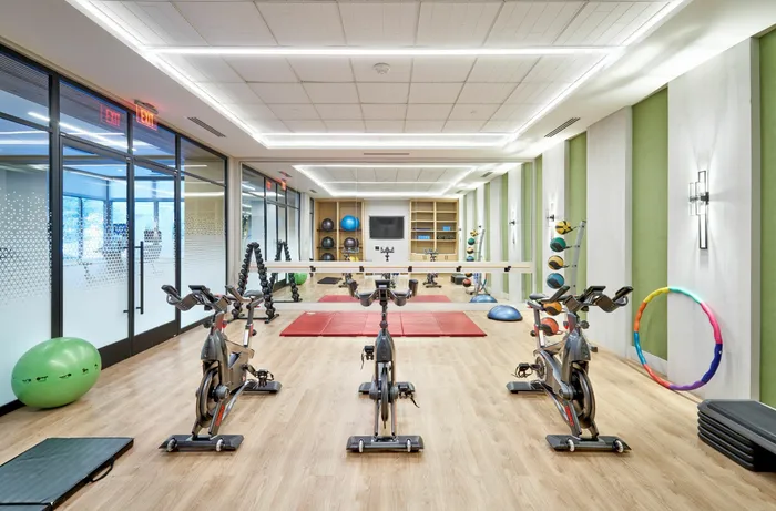 Brand New Yoga/Workout Studio With Fitness On Demand, Free Weights, Spin Bikes & More | Meridian at Ballston Commons | Luxury Arlington VA Apartments