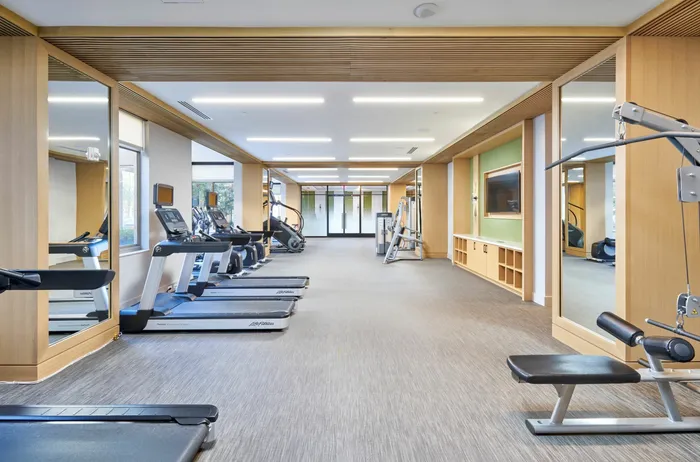 Newly Renovated Fitness Center With Cardio & Weight Machines, Free Weights & Brand New Yoga/Workout Studio | Meridian at Ballston Commons | Luxury Arlington VA Apartments