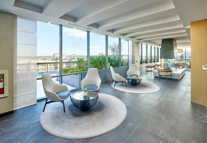 Expansive Rooftop Club Room With Indoor/Outdoor Area, Roof Deck Access, Fireplace & Numerous Seating Areas | Meridian on First | Navy Yard Apartments | Luxury Washington DC Apartments