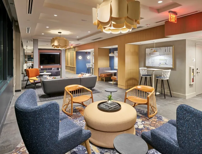 Expansive Rooftop Club Room With Indoor/Outdoor Area, Roof Deck Access, Fireplace & Numerous Seating Areas | Meridian on First | Navy Yard Apartments | Luxury Washington DC Apartments