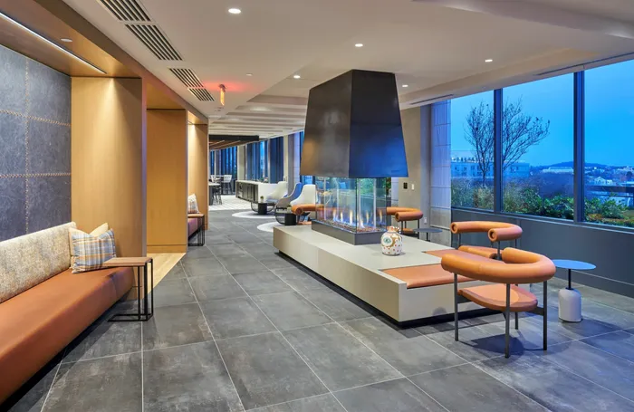 Expansive Rooftop Club Room With Indoor/Outdoor Area, Roof Deck Access, Fireplace & Numerous Seating Areas | Meridian on First | Navy Yard Apartments | Luxury Washington DC Apartments