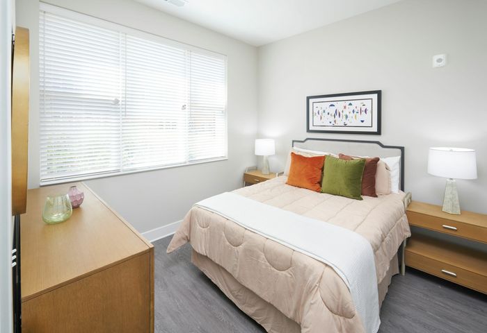 Large Bedroom With Wood-Style Flooring | Robinson at One University | Affordable Fairfax VA Apartments