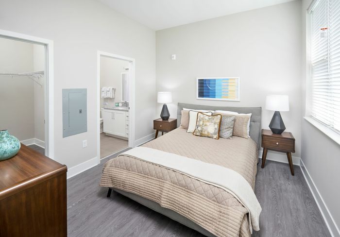 Large Bedroom With Wood-Style Flooring | Robinson at One University | Affordable Fairfax VA Apartments