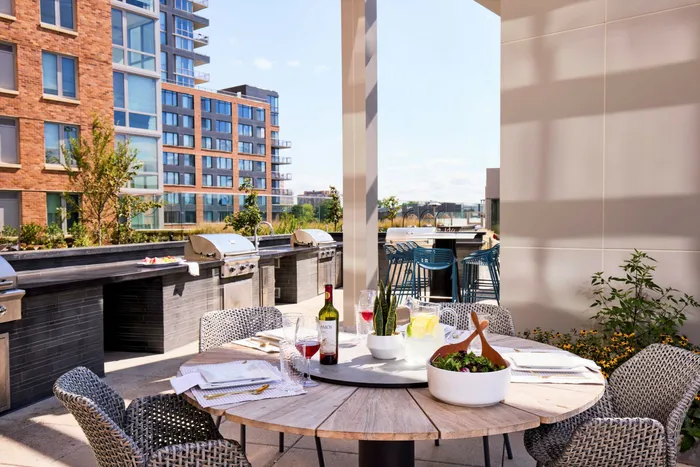Enjoy Our BBQ Area Complete With 4 Grills & Many Seating Areas | Meridian 2250 at Eisenhower Station | Luxury Alexandria VA Apartments
