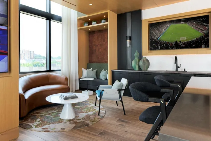 Game Room With Multiple Seating Areas, Televisions, Billiards, Foosball, Shuffleboard and Giant Scrabble | Meridian 2250 at Eisenhower Station | Luxury Alexandria VA Apartments