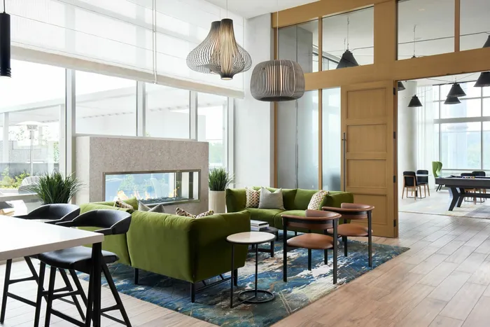 Expansive Club Room With Multiple Seating Areas & Indoor/Outdoor Fire Place | Meridian 2250 at Eisenhower Station | Luxury Alexandria VA Apartments