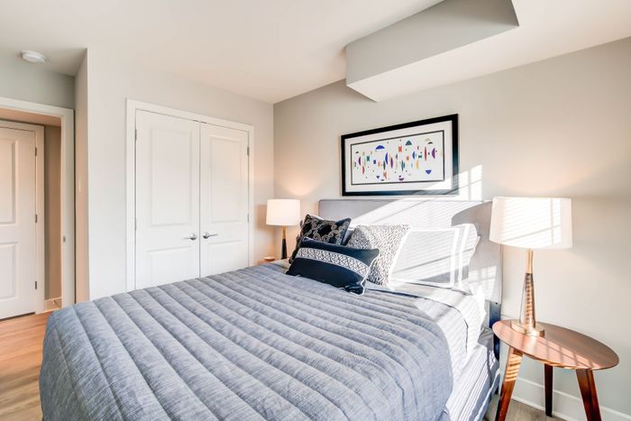 Spacious Newly Renovated Bedrooms With Wood-Style Flooring | Creekside Village | Affordable Alexandria VA Apartments