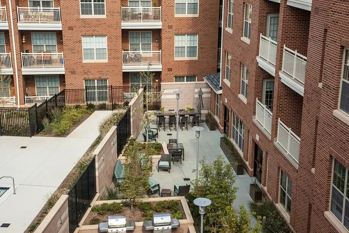 Urban Courtyard With BBQ & Seating Areas | Madison at Ballston Station | Arlington VA Apartments