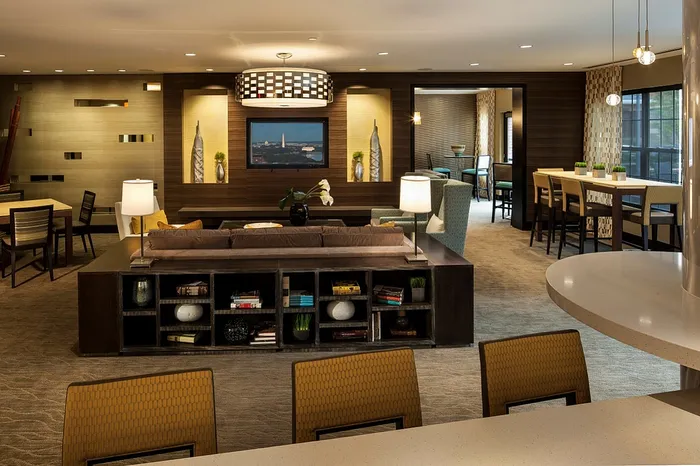 Contemporary Club Room With Bar Area, TV & Numerous Seating Areas | Madison at Ballston Station | Arlington VA Apartments