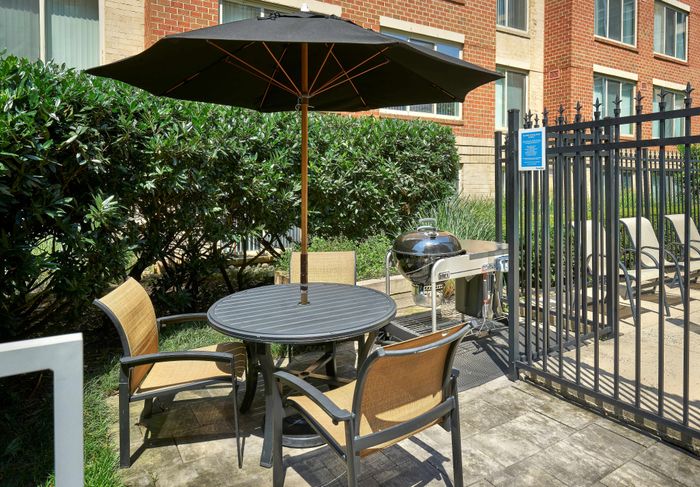 Enjoy the BBQ Area- New Grills 2025 | Carlyle Place | Luxury Alexandria VA Apartments
