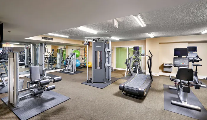 Photo of Cardio & Weight Equipment in Our Fitness Center | Meridian at Courthouse Commons | Arlington VA Apartments