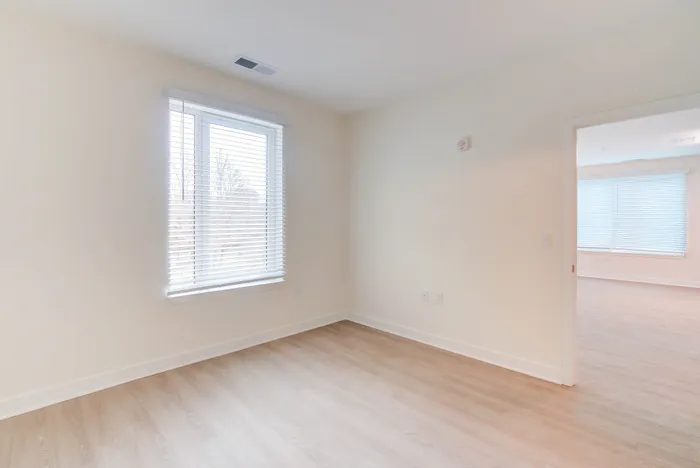 Large Primary Bedroom | Indigo at McLean Station | Affordable Tysons Corner Apartments | Affordable Fairfax VA Apartments | Affordable McLean Apartments