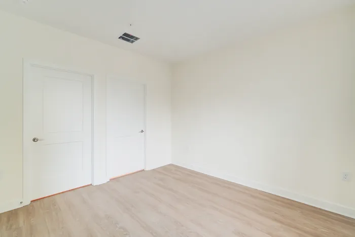 Large Primary Bedroom | Indigo at McLean Station | Affordable Tysons Corner Apartments | Affordable Fairfax VA Apartments | Affordable McLean Apartments