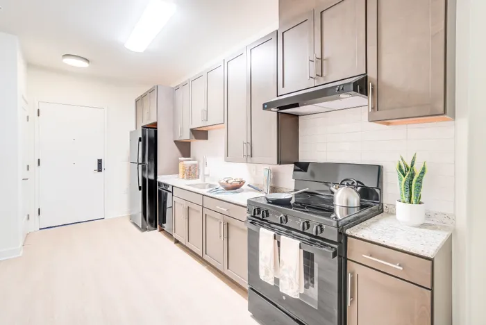 Large Open Kitchen- A 1BR-H ANSI Accessible Floor Plan | Indigo at McLean Station | Affordable Tysons Corner Apartments | Affordable Fairfax VA Apartments | Affordable McLean VA Apartments