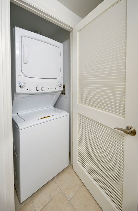 In-unit stacked washer and dryer in an Ellington One Bedroom apartment | Meridian at Grosvenor Station | Luxury North Bethesda MD Apartments | Luxury Rockville MD Apartments