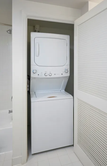 In-unit washer and dryer in renovated Newport 1BR bedroom at Meridian at Eisenhower Alexandria. | Luxury Alexandria VA Apartments