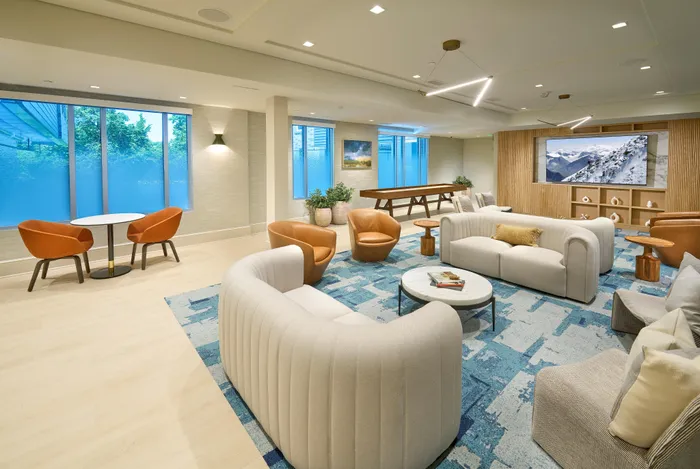 Indigo at McLean Station Phase I Club Room With Shuffleboard, TV, Kitchen & More | Affordable Tysons Corner Apartments | Affordable McLean VA Apartments | Affordable Fairfax VA Apartments
