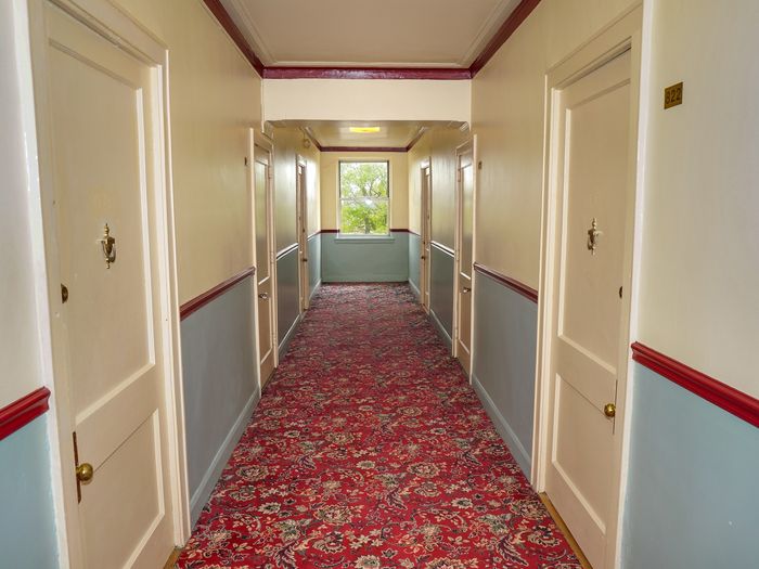 Red carpeted public hallway of the Morrowfield
