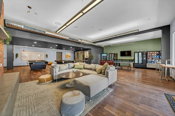 Student and resident work and study space, for productivity and social events both. Ping pong table, vending machines, community events calendar, and pool tables.