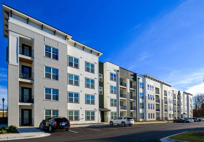 4 story building exterior at Cadence Sugar Hill, Sugar Hill, GA 30518