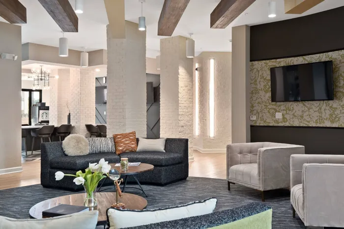 Clubhouse area with TVs The Parq at Chesterfield Apartment Homes, Chesterfield, MO 63017