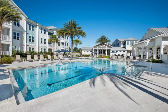 pool and apartment buildings on sunny day