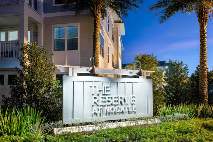 monument sign of The Reserve at Nocatee at nighttime