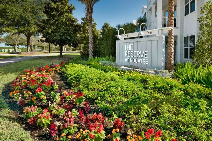 monument sign of The Reserve at Nocatee during the day