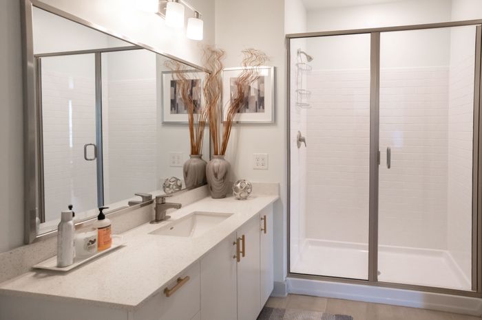 Bathroom with ample counter space and glass shower door at Park 35 Birmingham AL 35222