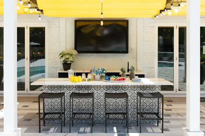 Outdoor Kitchen and Bar Area at The Kendrick Apartments in Atlanta, GA 30324