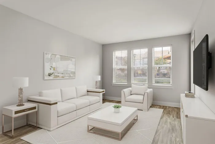 Dog-Friendly Apartments in Matthews, NC - Furnished Living Room with Wood-Inspired Plank Flooring, Floor-to-Ceiling Windows, and a Door to a Private Patio/Balcony