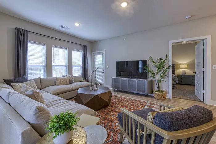 two bedroom model living room Encore Apartments Belton MO